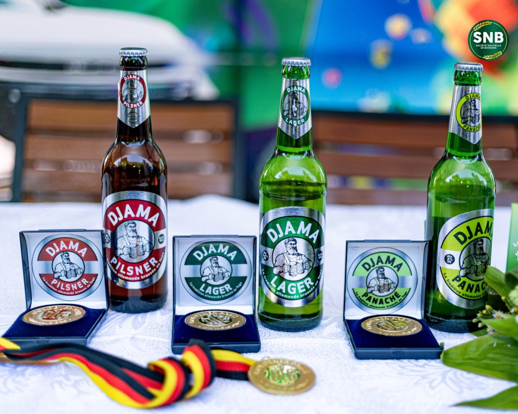 La Société Nouvelle de Boissons (SNB) Togo : Une Brillance Reconnaissante sur la Scène Internationale